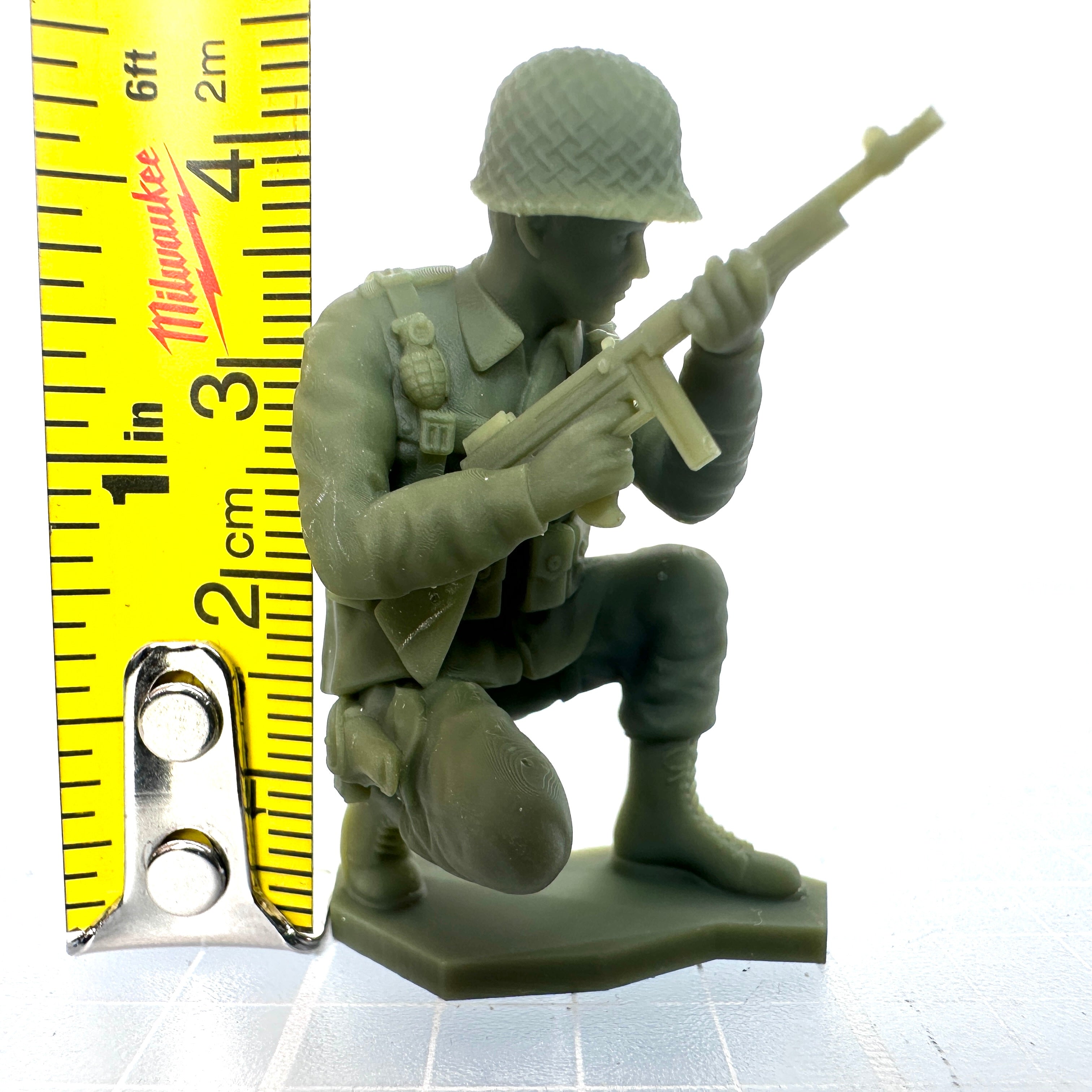 WW2 American Soldier Crouched with Thompson