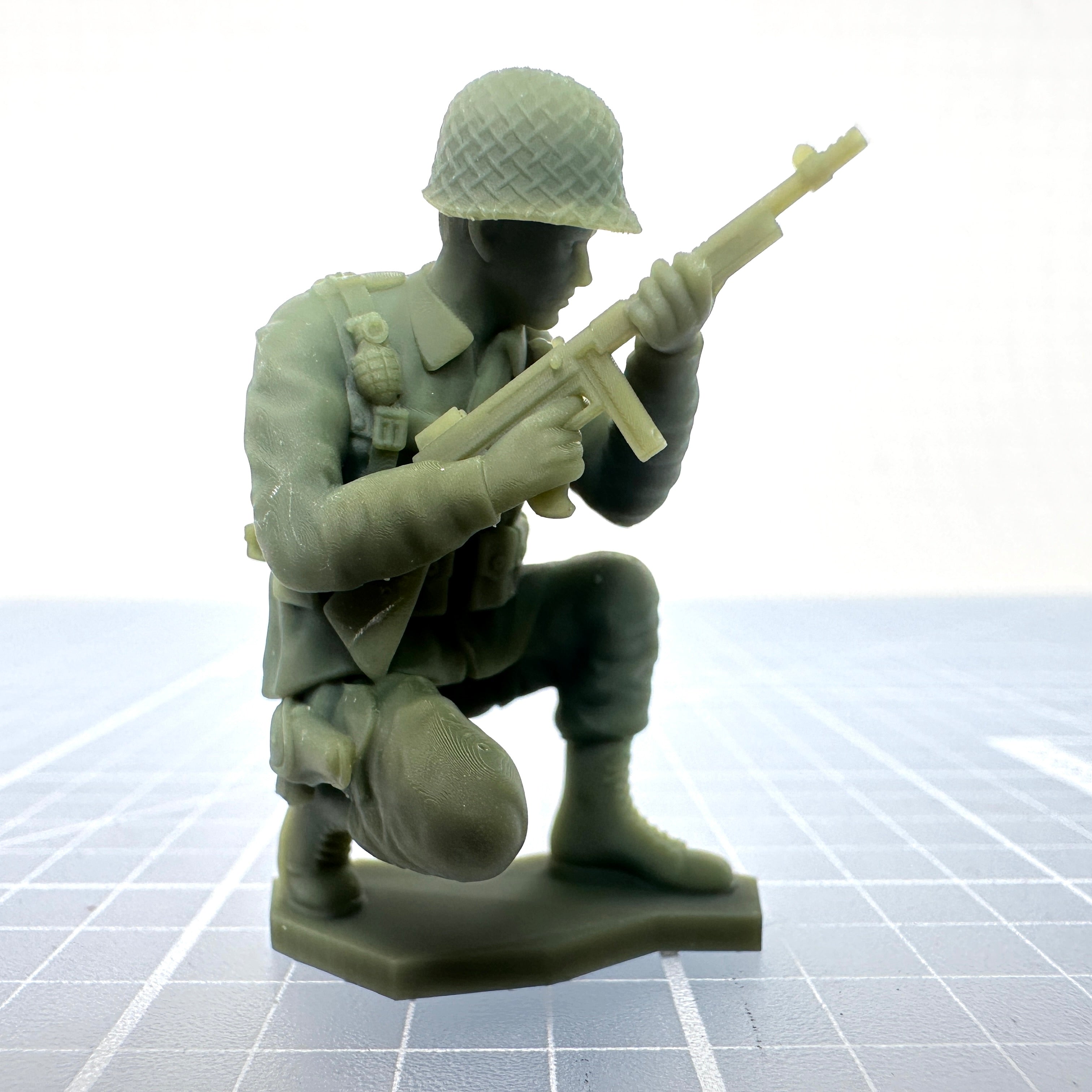 WW2 American Soldier Crouched with Thompson
